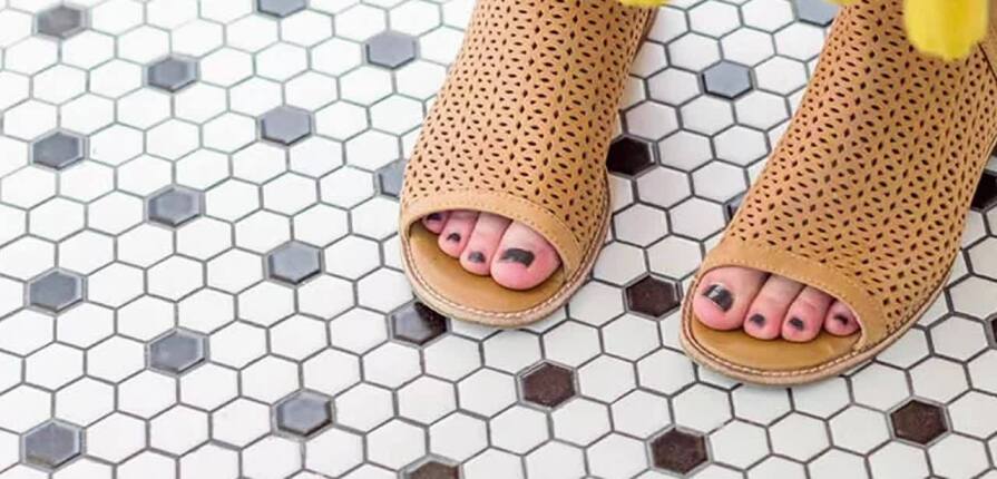 Matte black was a natural pairing for this bathroom renovation. See the full rev...